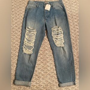 Wonderly ripped out knee denim jeans. NWT size 28